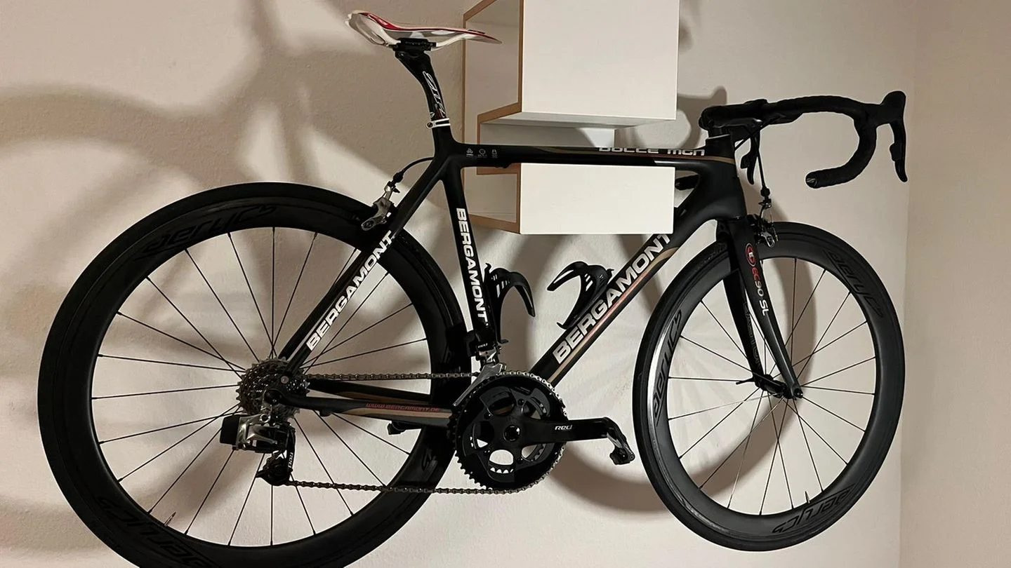 Is Riding a Bicycle on the Wall Art or Madness?